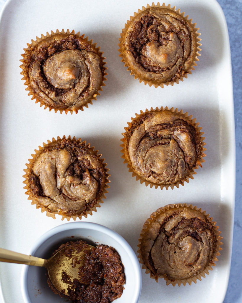 Easy cinnamon roll breakfast muffin recipe with a homemade cinnamon streusel 