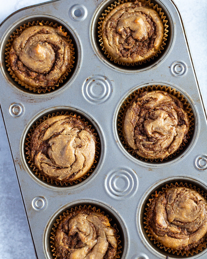 Cinnamon Roll Muffins in a muffin pan 
