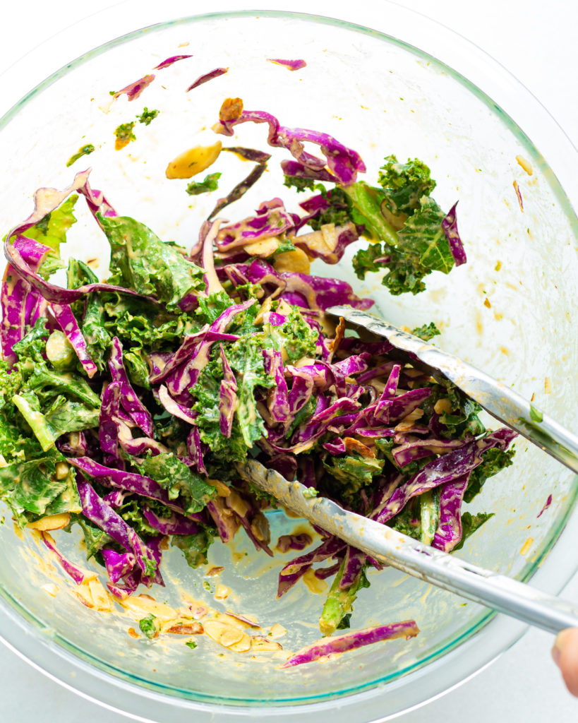 Spicy Kale & Cabbage Salad in mixing bowl