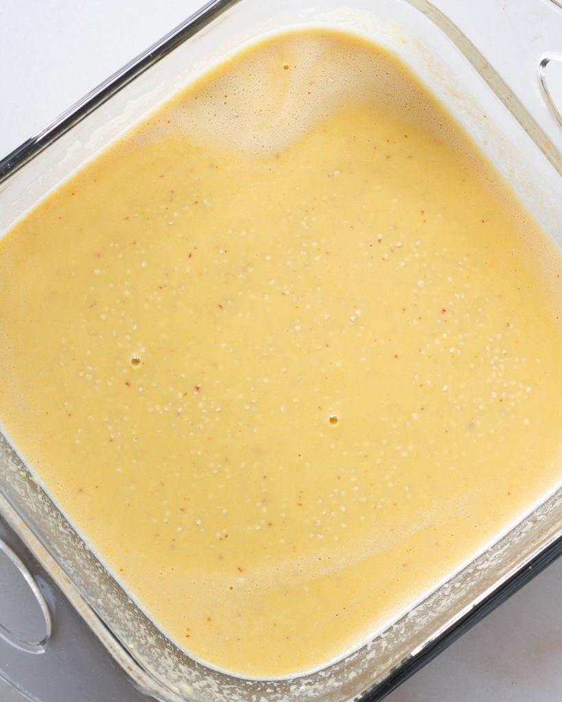 quinoa and corn mixture in baking pan