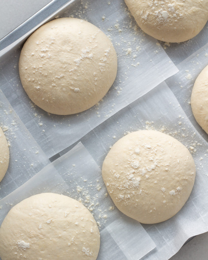 Ciabatta rolls on baking sheet