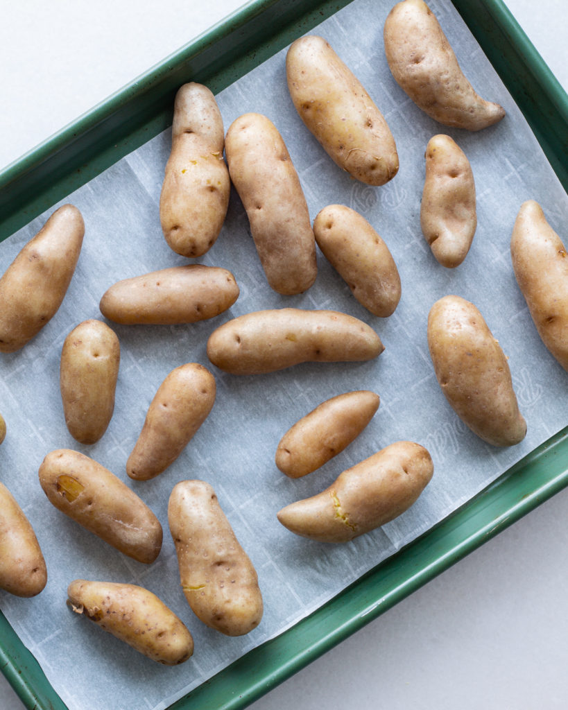 Potatoes on baking sheet