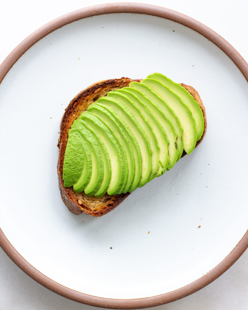 Sliced avocado on toast