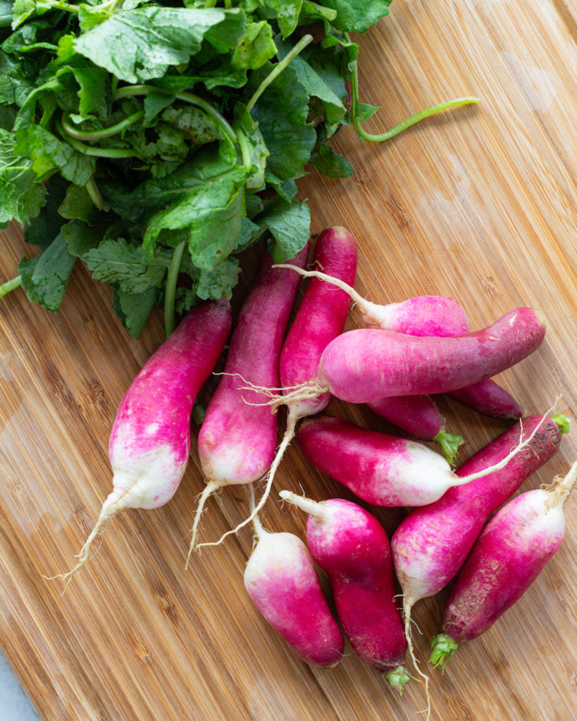 Fresh radishes and greens