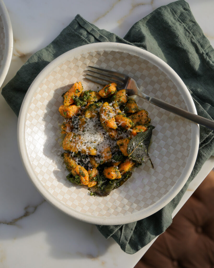 sweet potato gnocchi being served on the counter