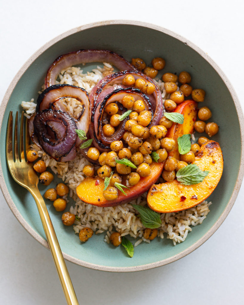 Finished Crispy Chickpea Bowl with Spiced Peaches & Red Onions