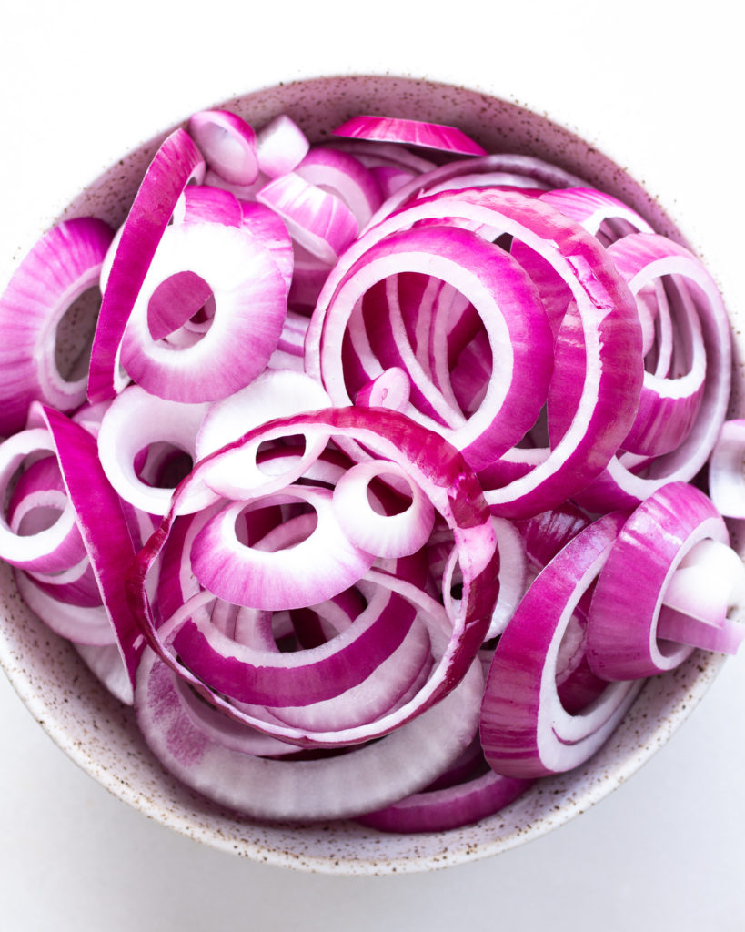 Raw red onion, sliced