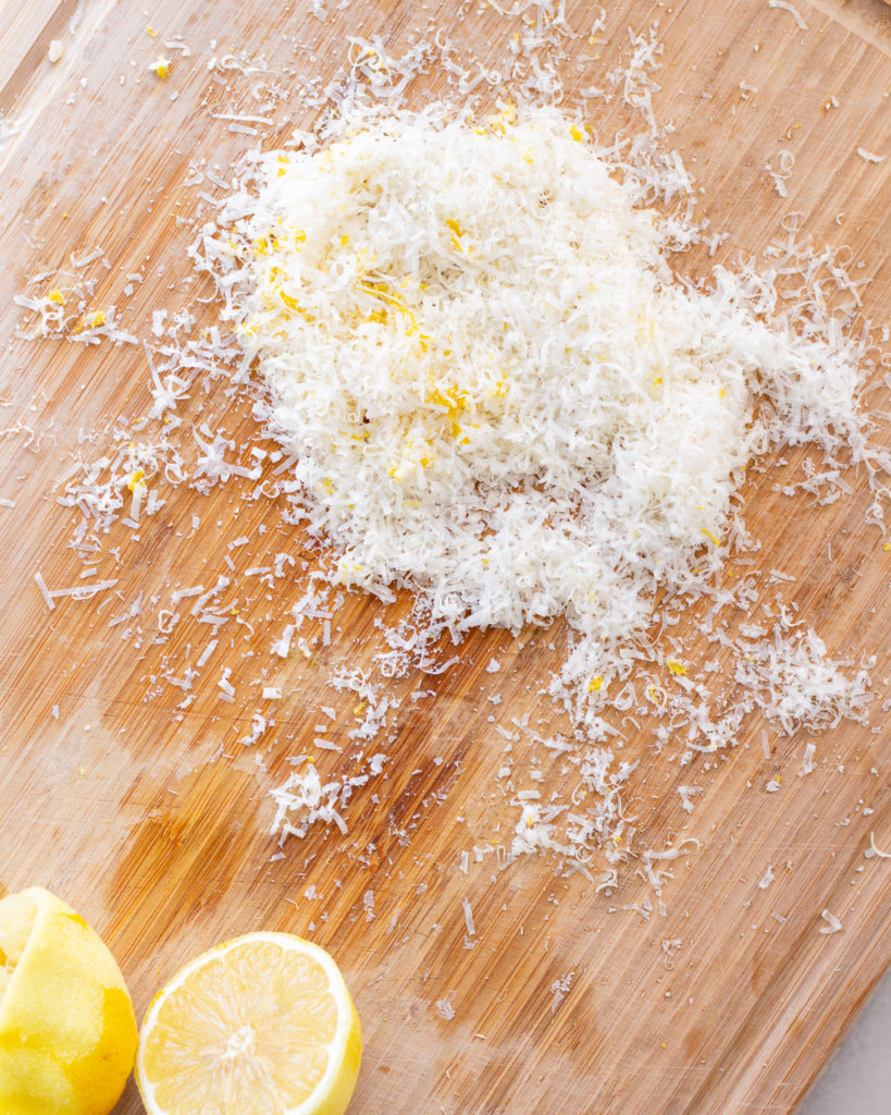 Shredded parmesan and grated lemon zest
