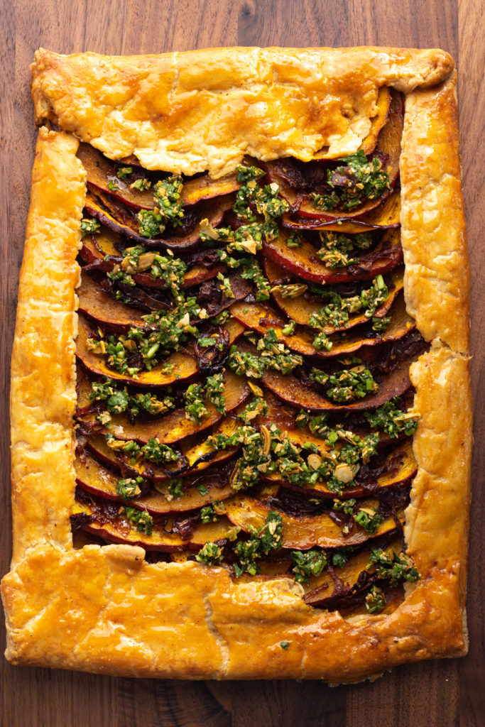 Finished Pumpkin Tart with Caramelized Onions and Pumpkin Seed Gremolata