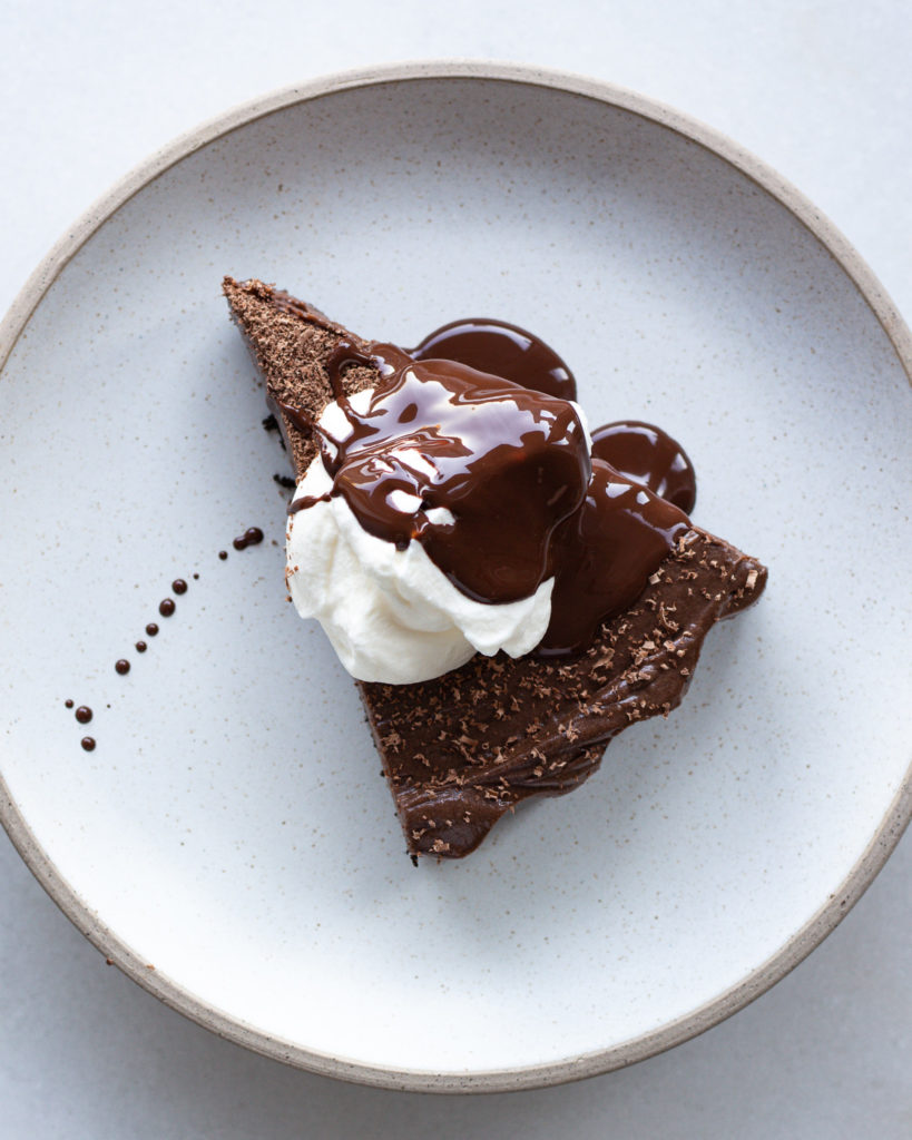 Slice of finished chocolate cheesecake