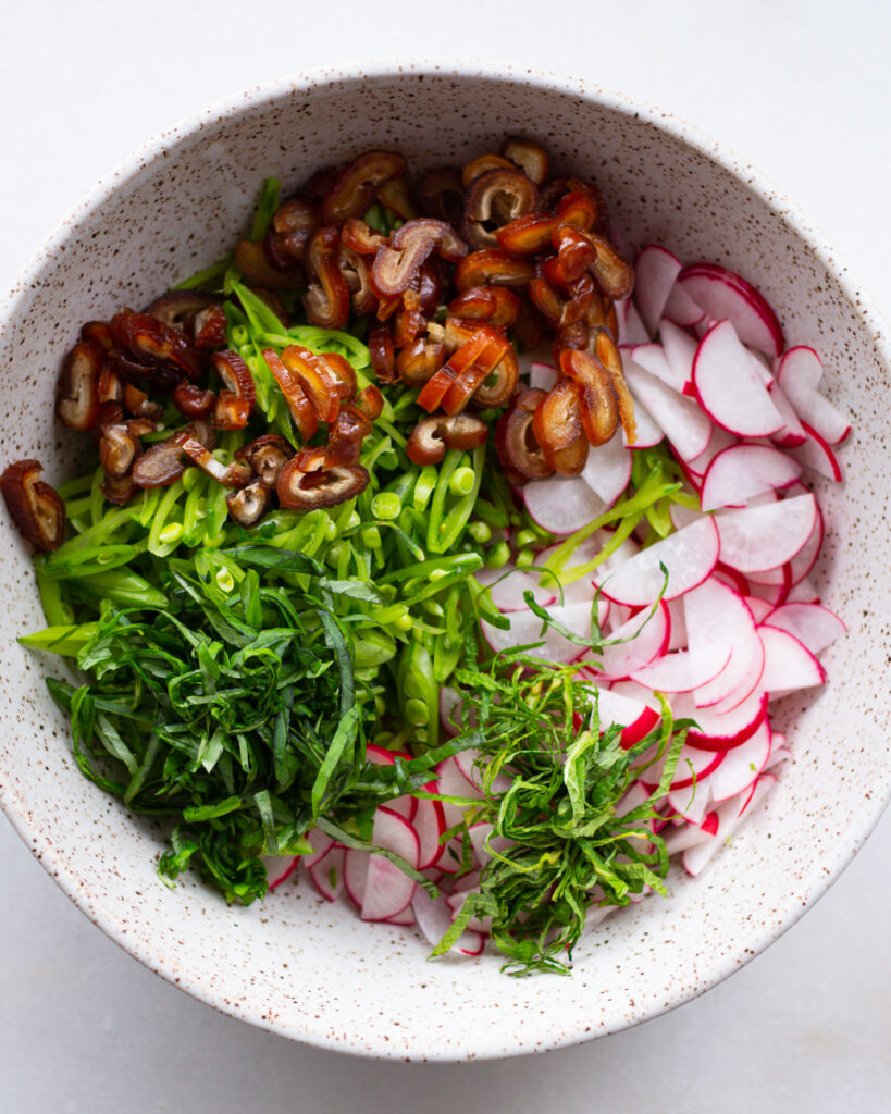 ingredients for the raw salad in a bowl