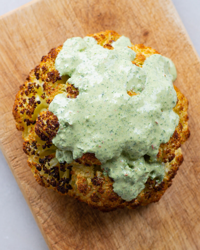 baked cauliflower with herby tahini dressing