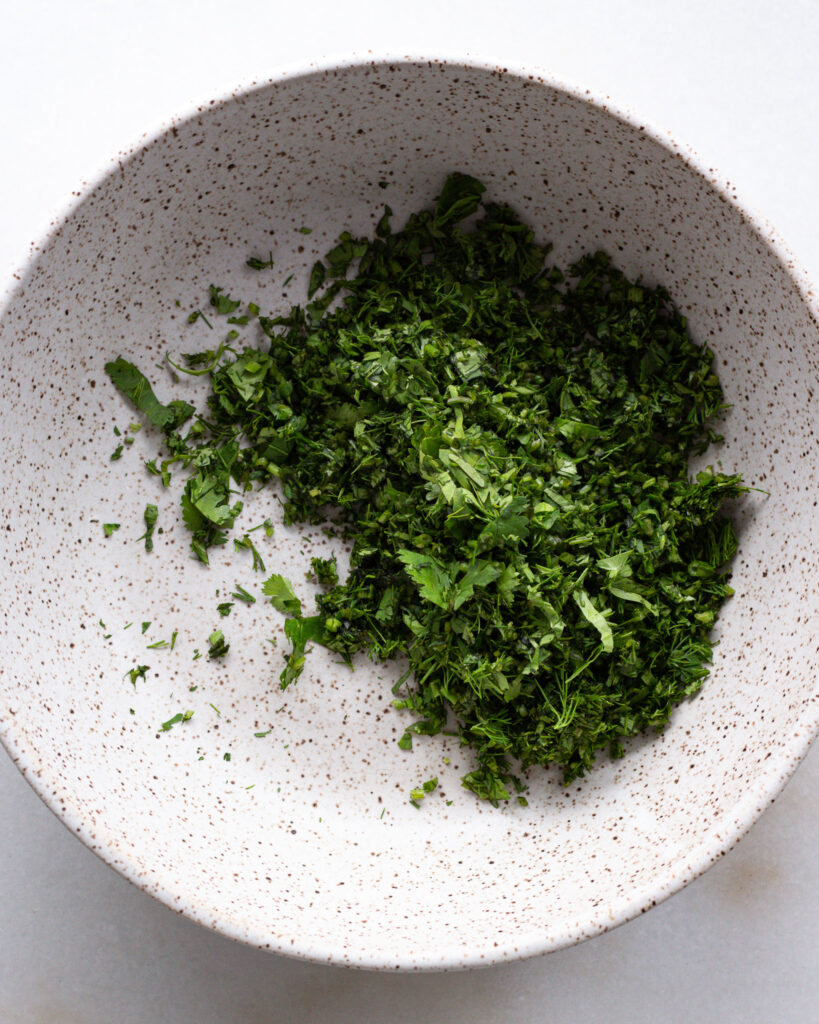 Chopped herbs in a bowl