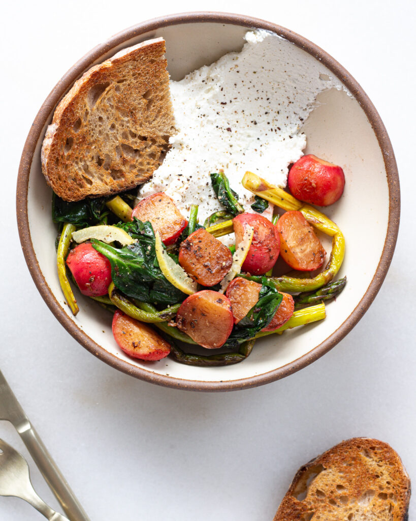 charred radish and asparagus bowl served with ricotta cheese and toast