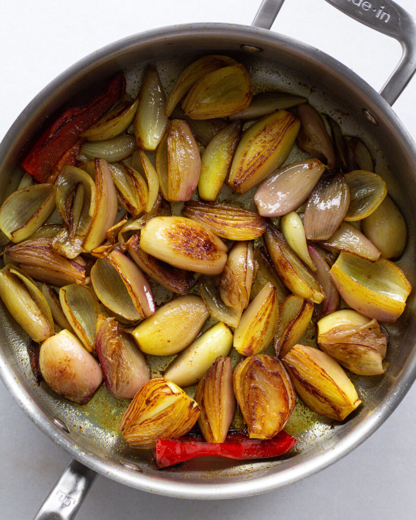 Turmeric shallots in a pan