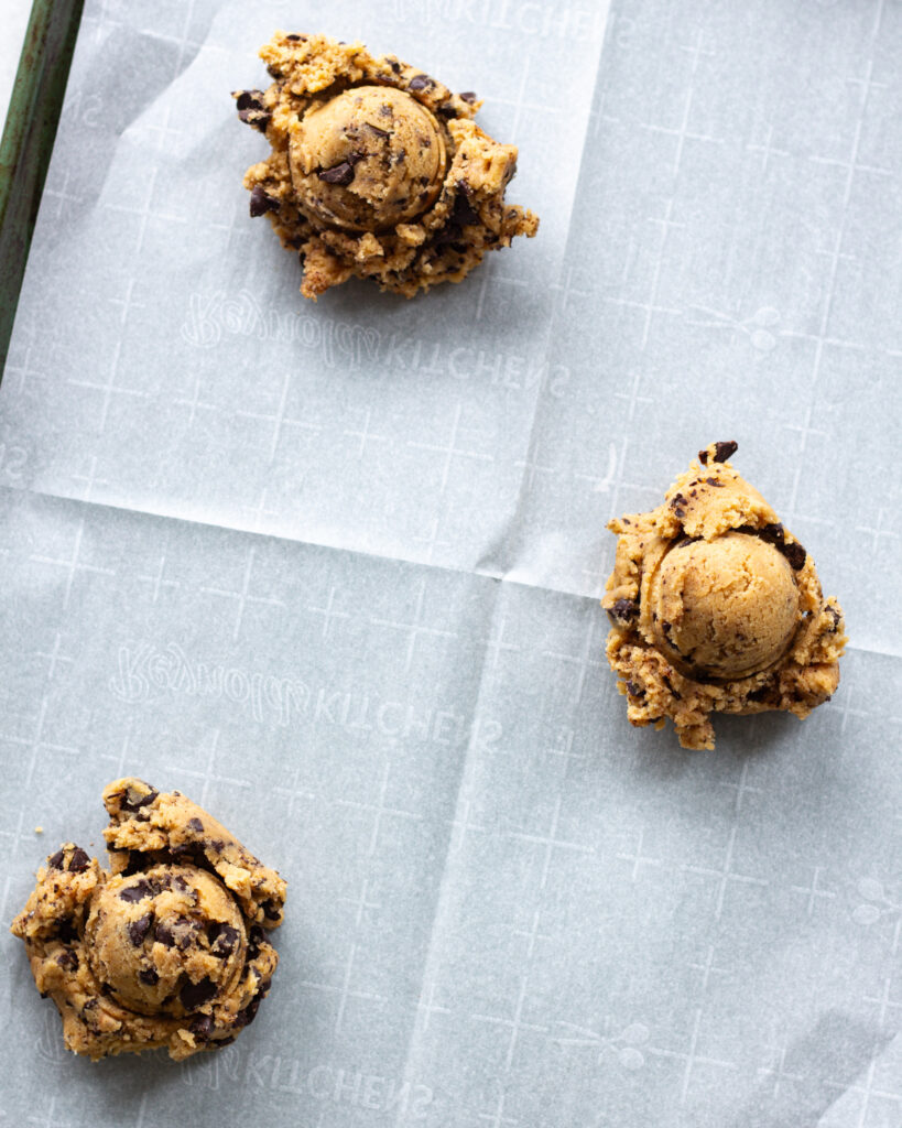 scoops of bread flour cookie dough on baking sheet