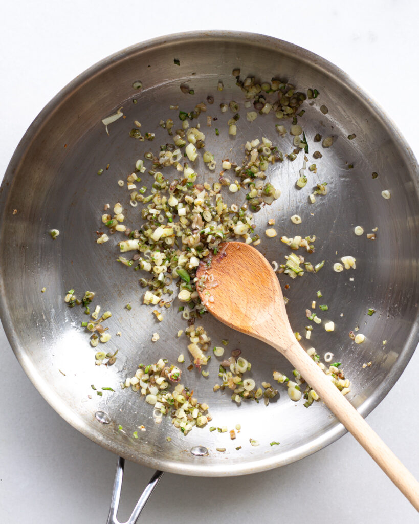 cooked ramp bottoms in a pan 