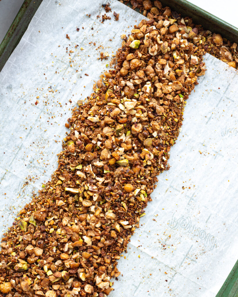 spicy nutty chickpea mixture on a sheet pan 