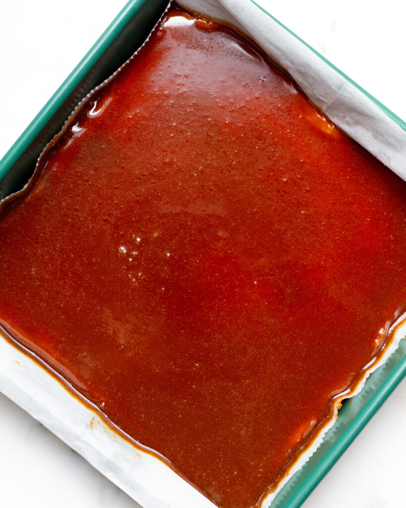 Chai caramel spread across the pumpkin bars