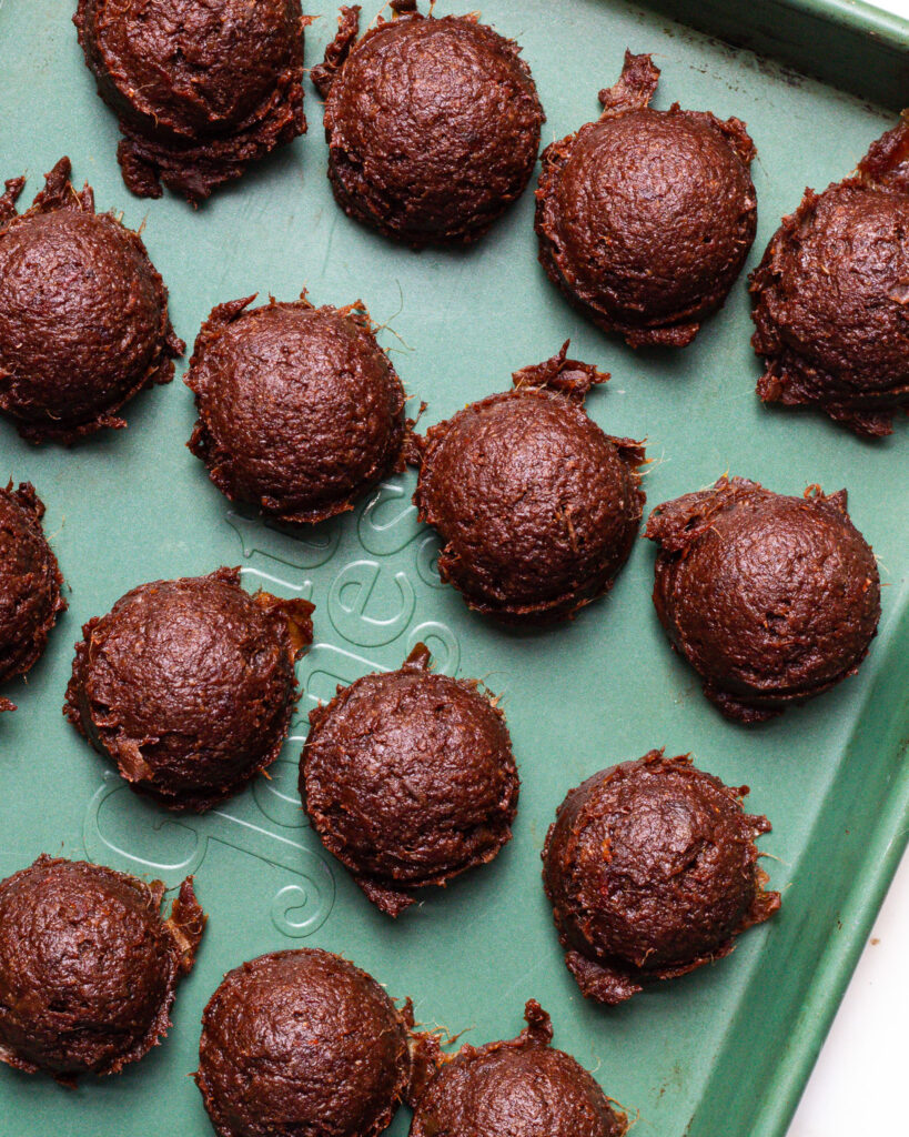 Scoops of the pumpkin spice brownie energy bites