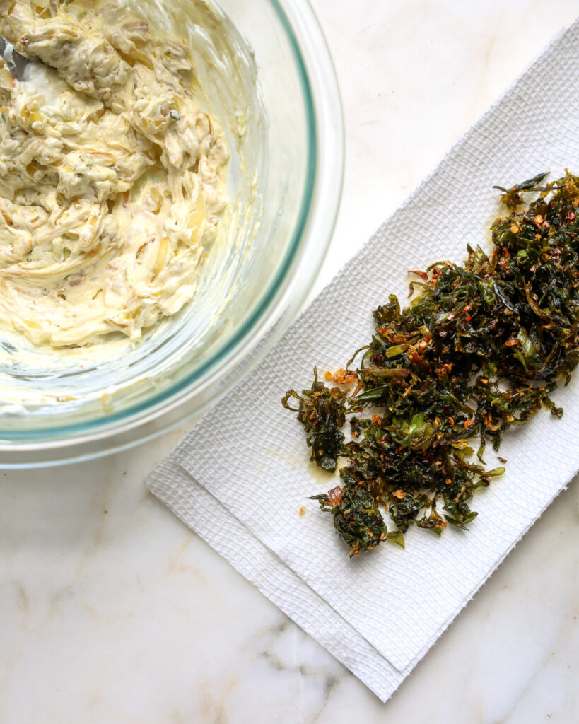 spring onion greens ready to go on top of a spring onion dip 