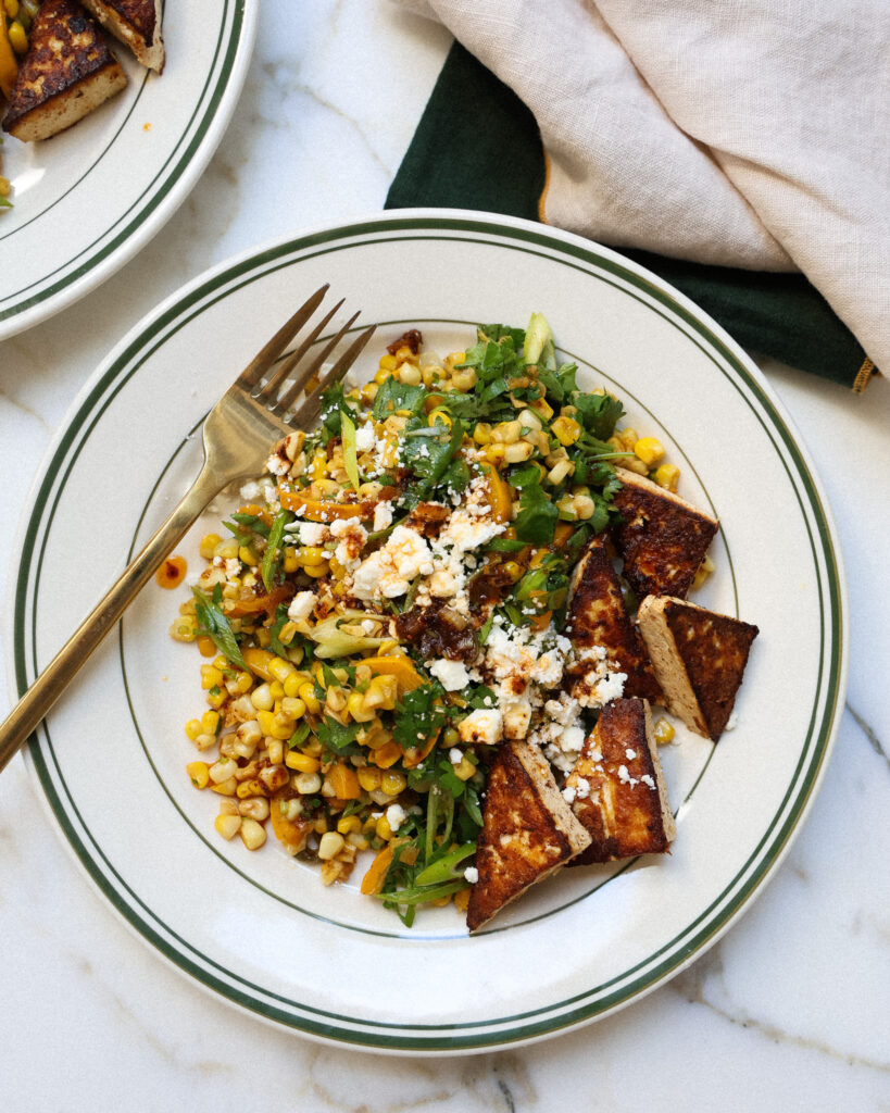 corn salad with scallion ancho chili dressing, plated