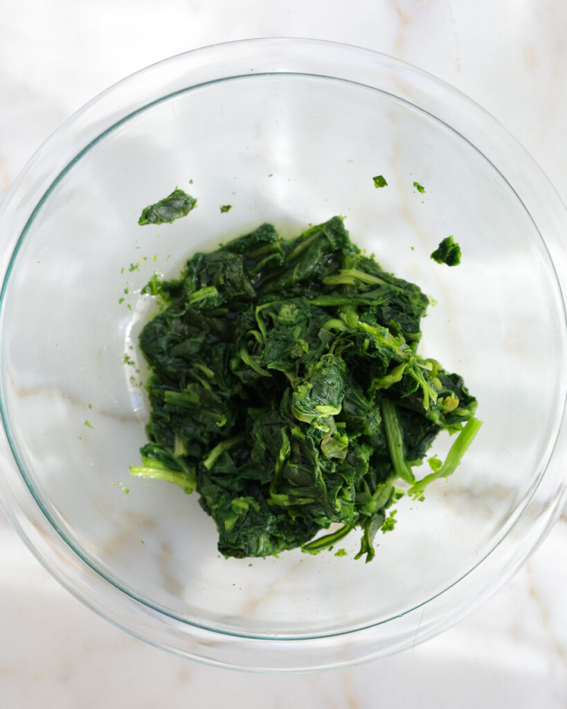 Frozen spinach and what it looks like before draining