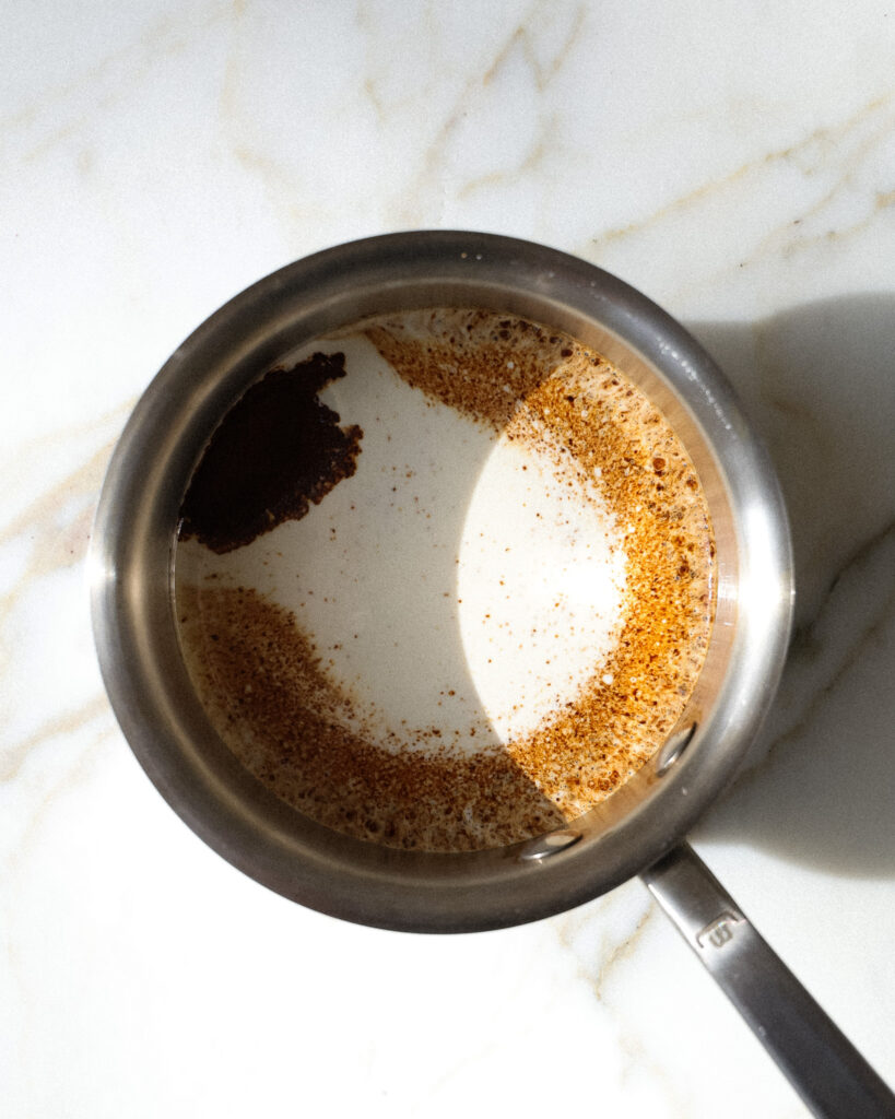 heavy cream and espresso simmering in a pot