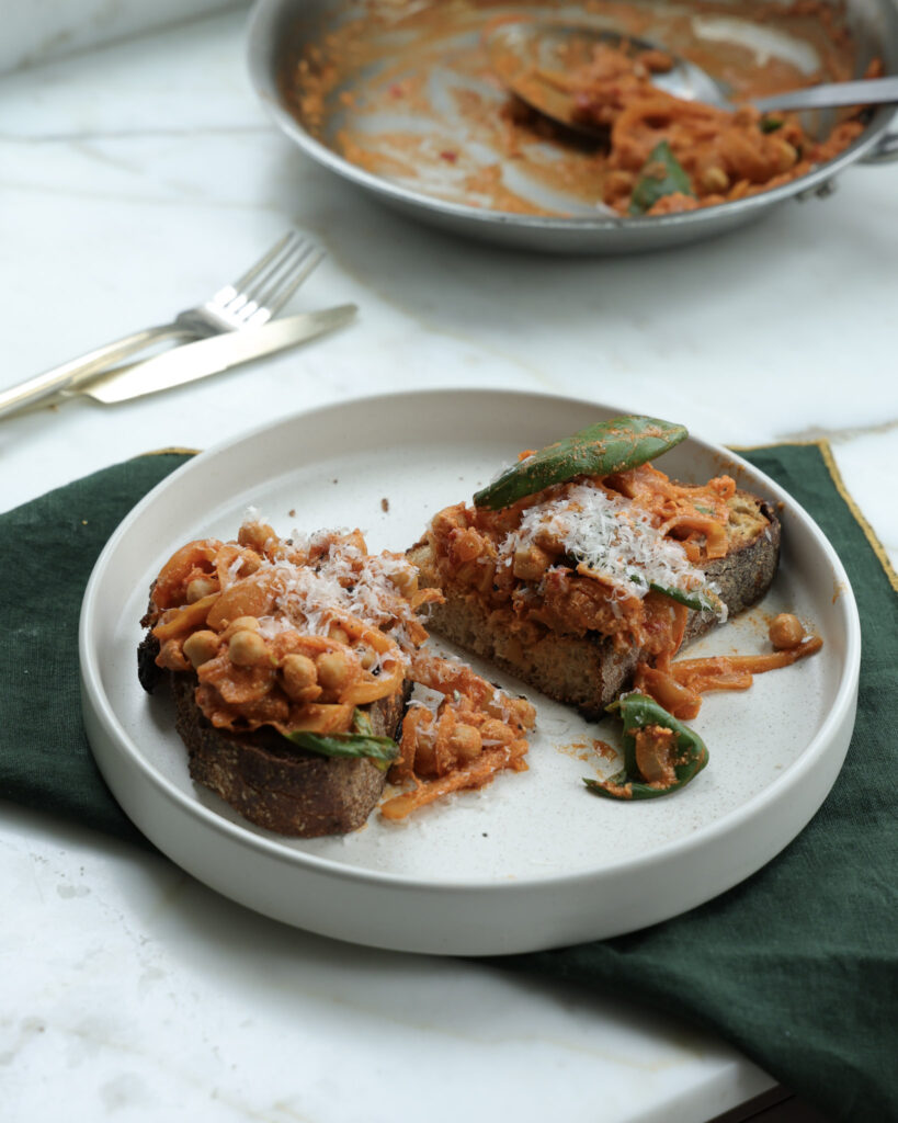 Beans alla vodka on toast cut in half.