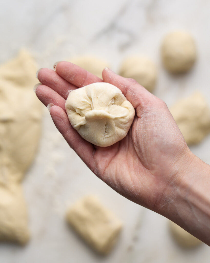 vegan brioche dough being shaped.
