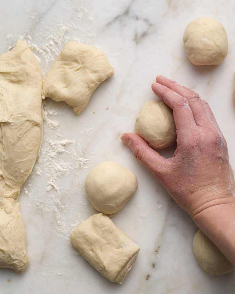 vegan brioche dough being shaped.