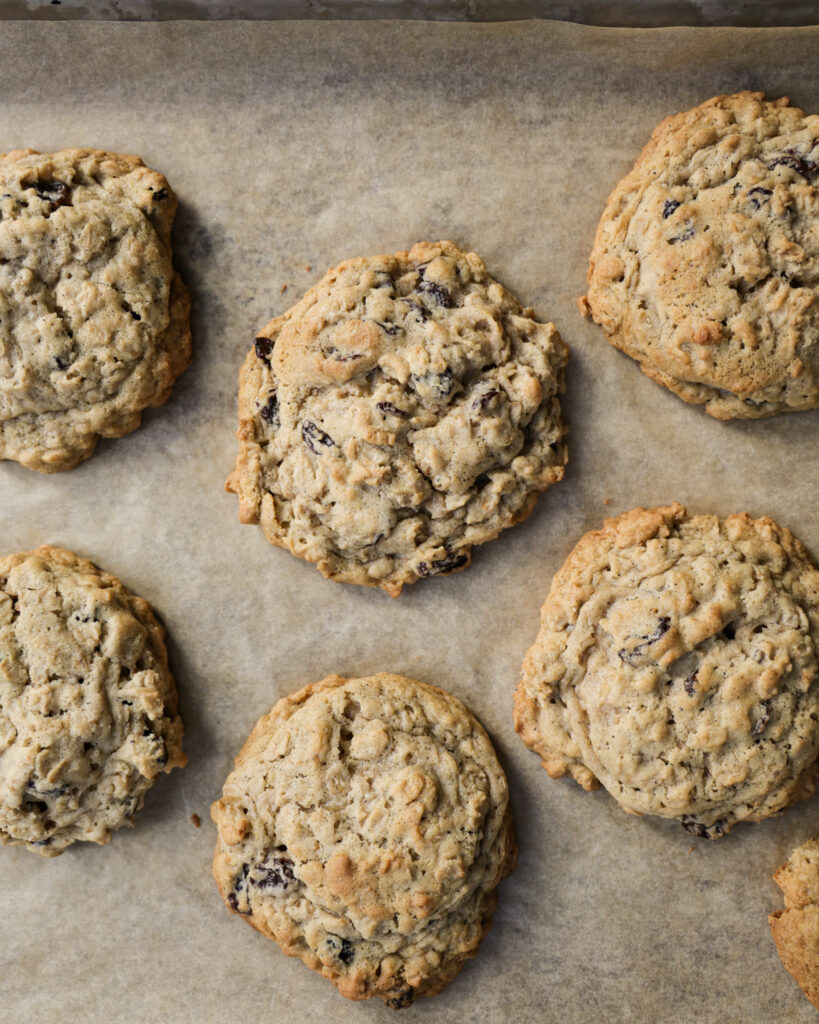baked brown butter oatmeal raisin cookies on baking sheet.