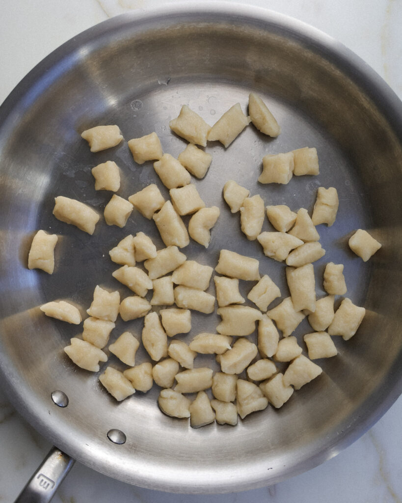 cauliflower gnocchi in a pan.