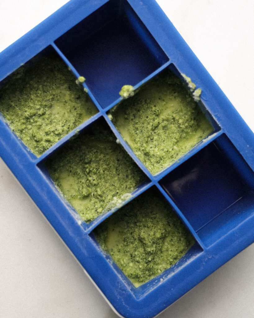 carrot top pesto in ice cube trays.