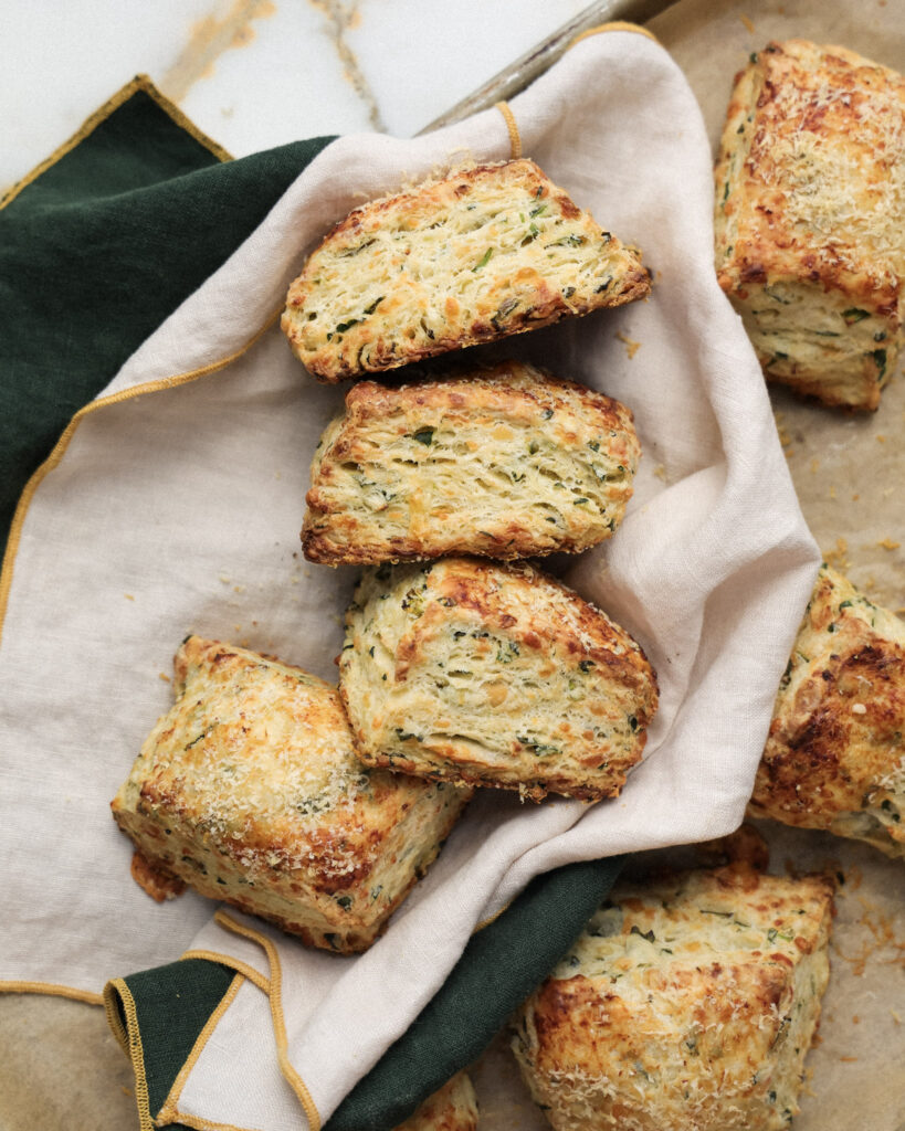 a stack of flaky three cheese ramp biscuits.
