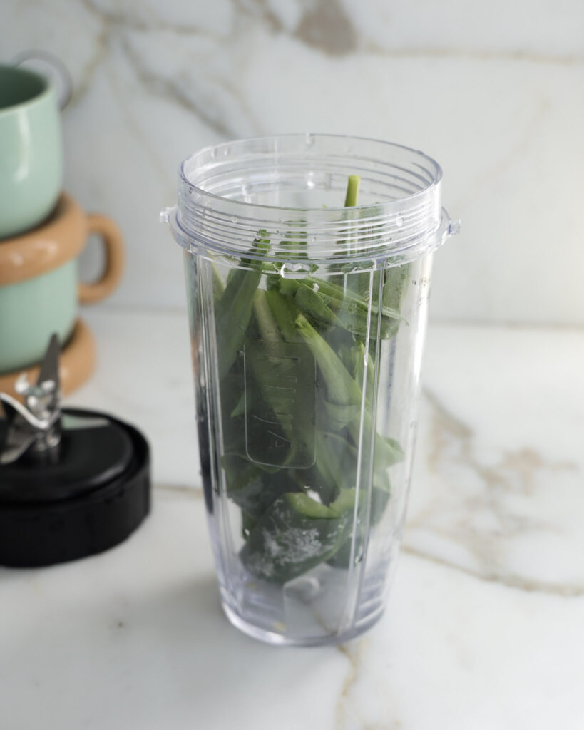 ramp leaves, jalapeno, and ginger in a blender.