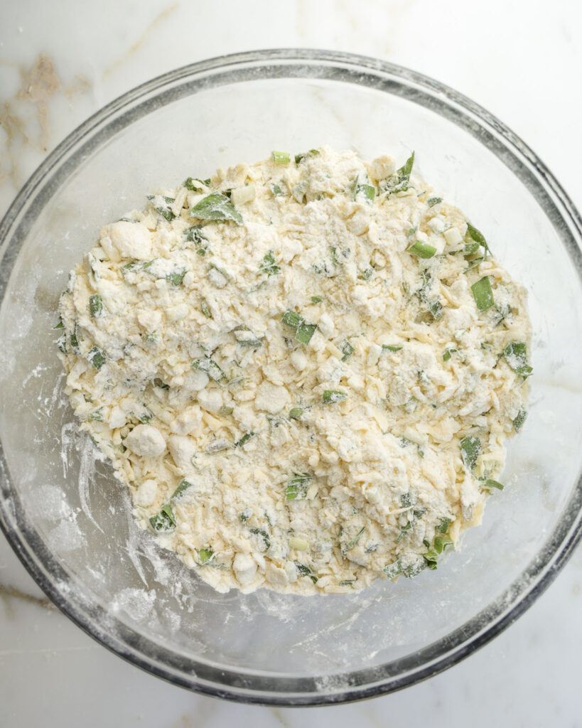 Dry ingredients for ramp biscuits mixed in a bowl.
