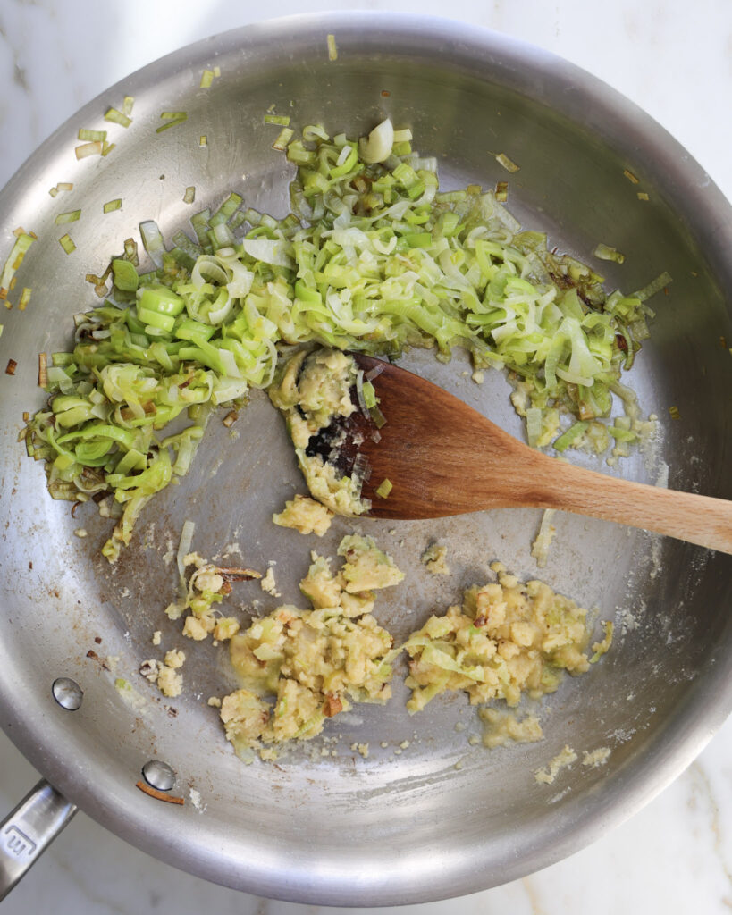 leeks and a roux in a pan.