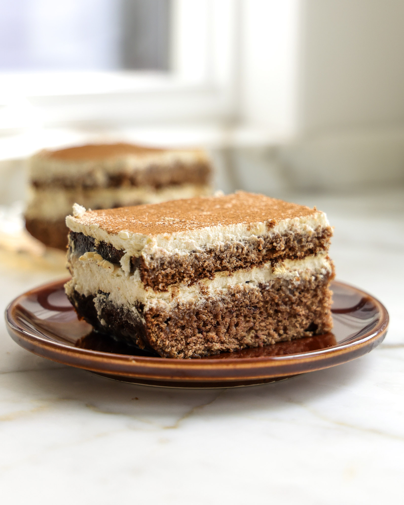 Sticky Toffee Pudding Tiramisu on a plate.