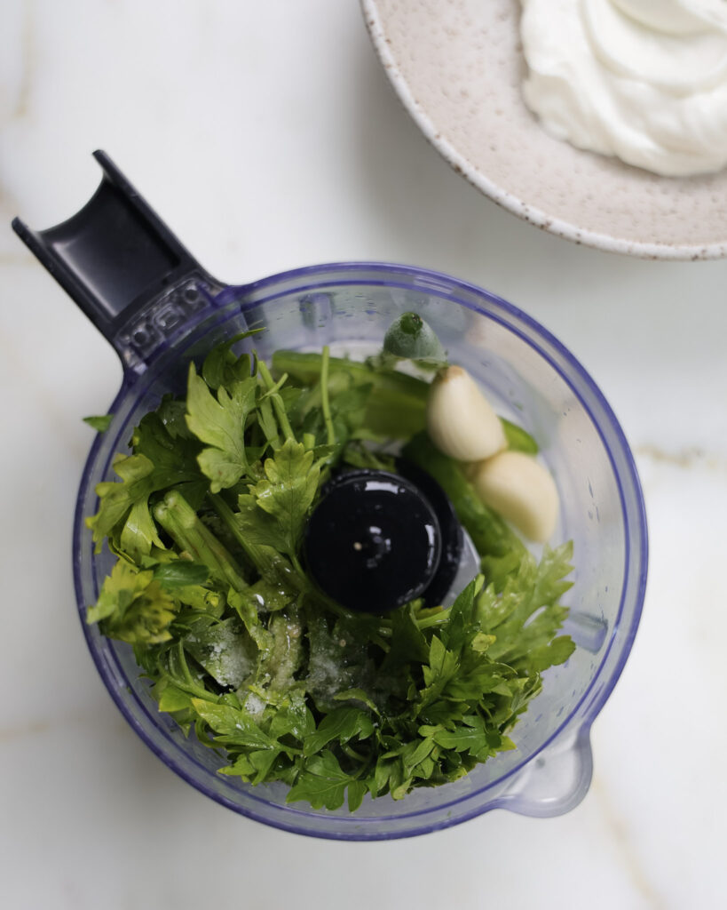 green sauce ingredients in the food processor.