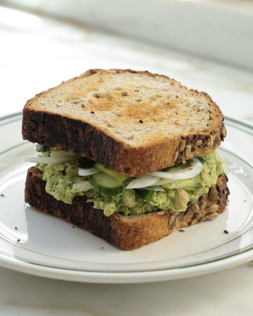 Chickpea salad sandwich on a plate.
