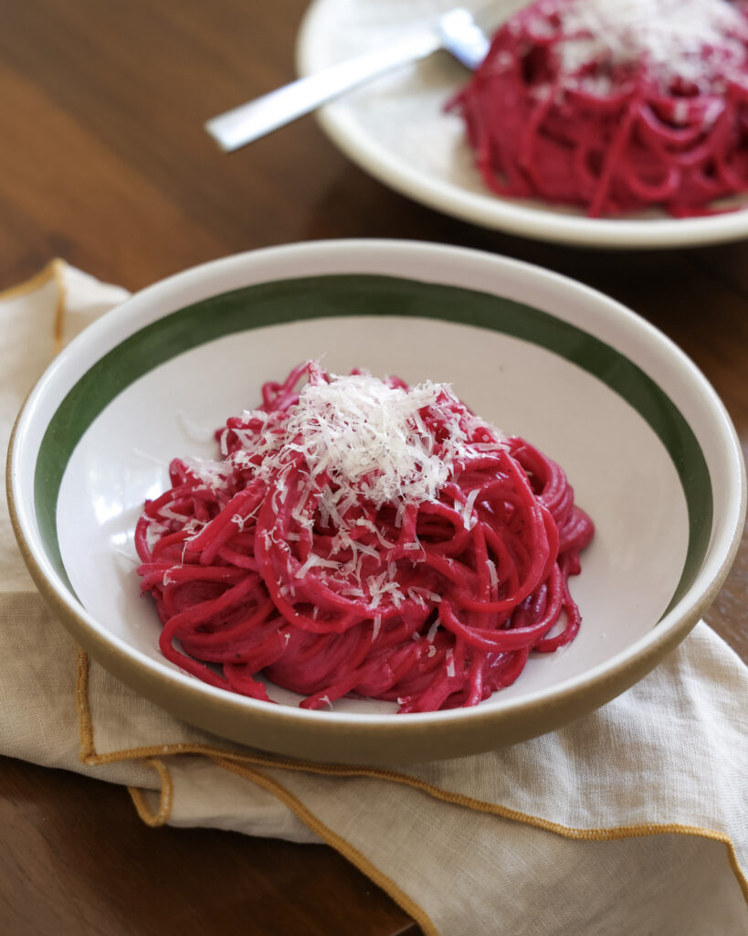 Beet Pasta topped with parmesan.