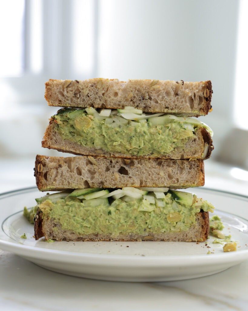 Chickpea salad sandwich cut in half.