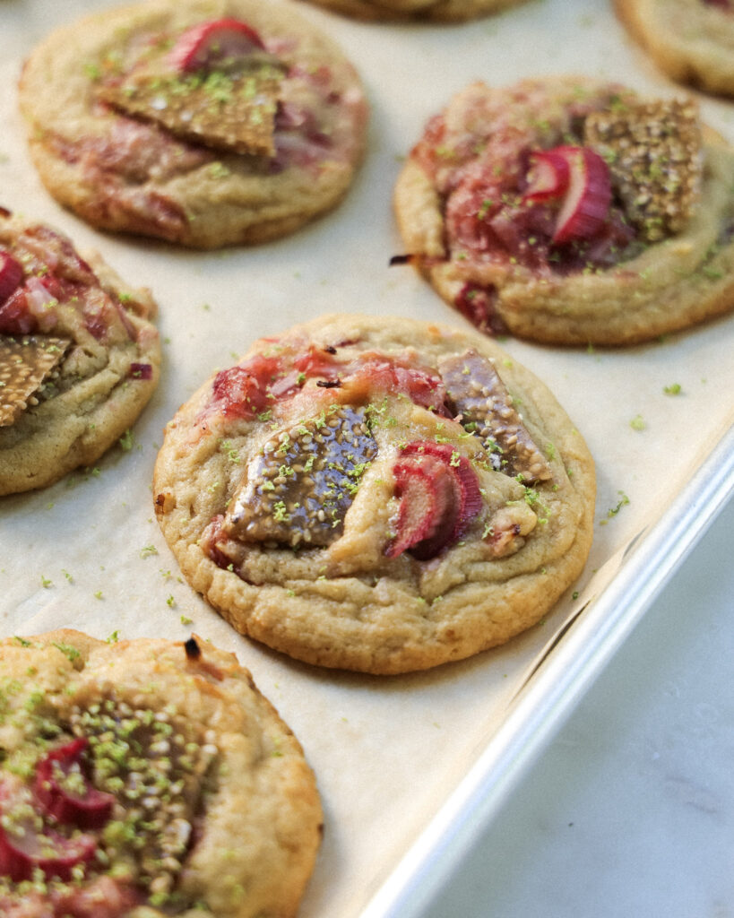Rhubarb cookies topped with lime zest and sesame bark.