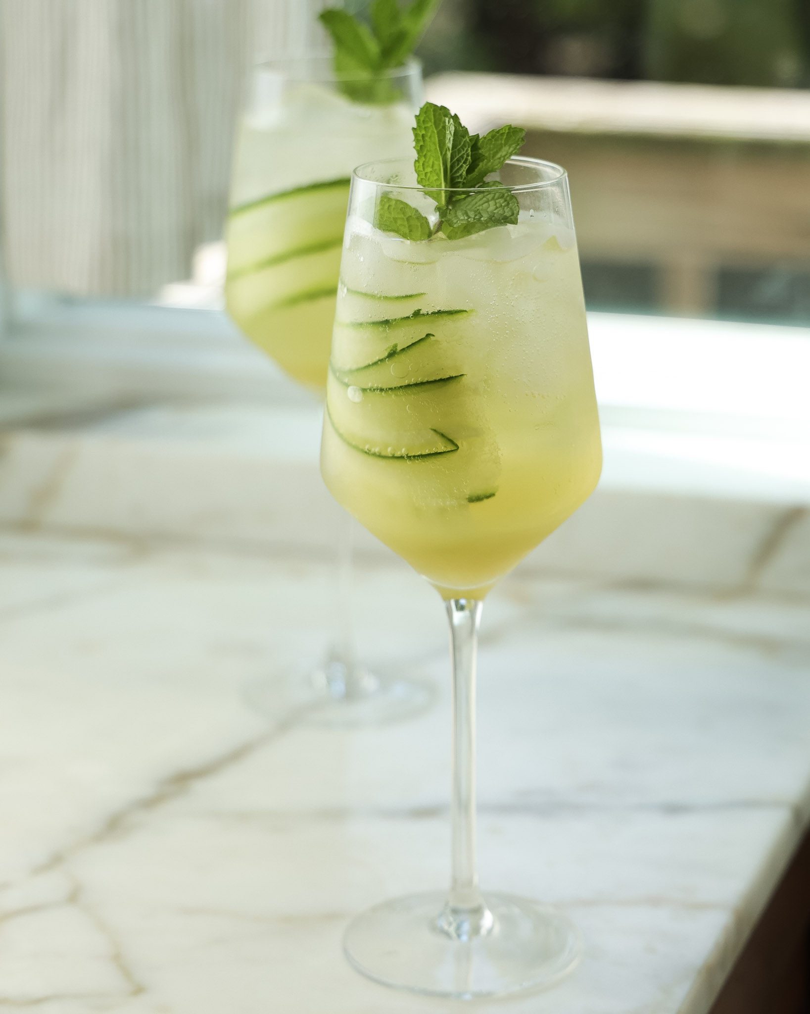 Cucumber spritz topped with mint.