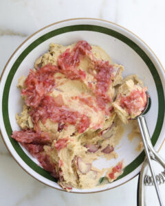 Rhubarb jam and macerated rhubarb swirled into rhubarb cookie dough.